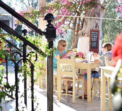 Nostos Restaurant table and trees